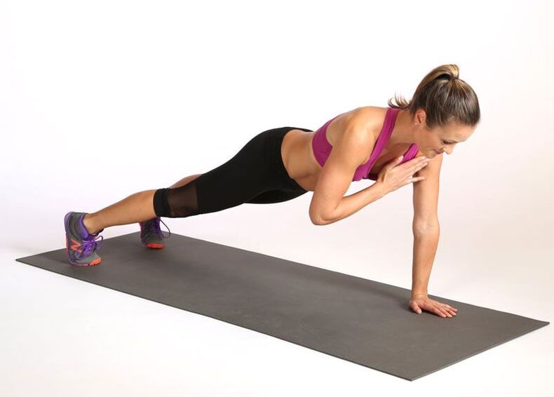 plank with alternating touches of the shoulders